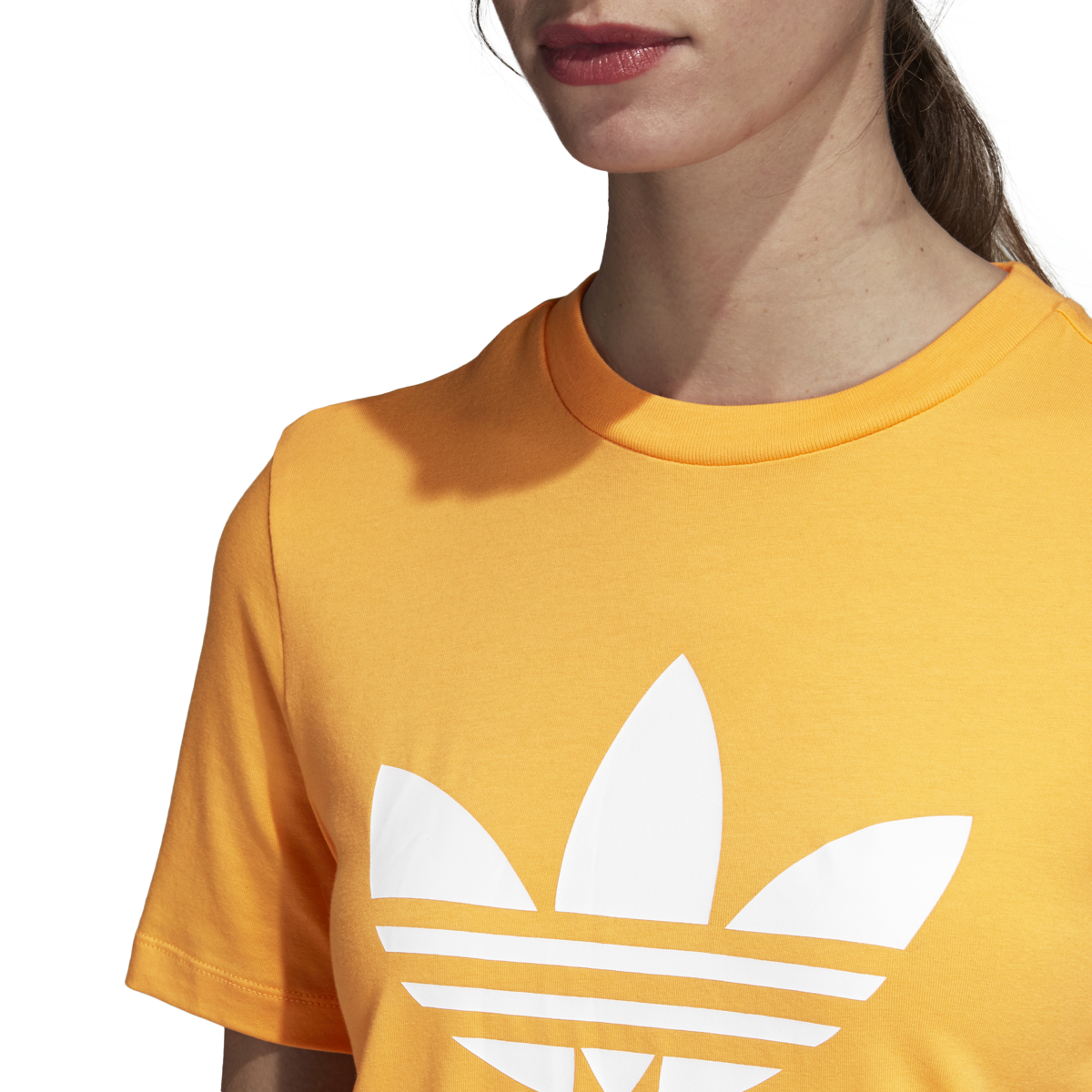 white and yellow adidas shirt